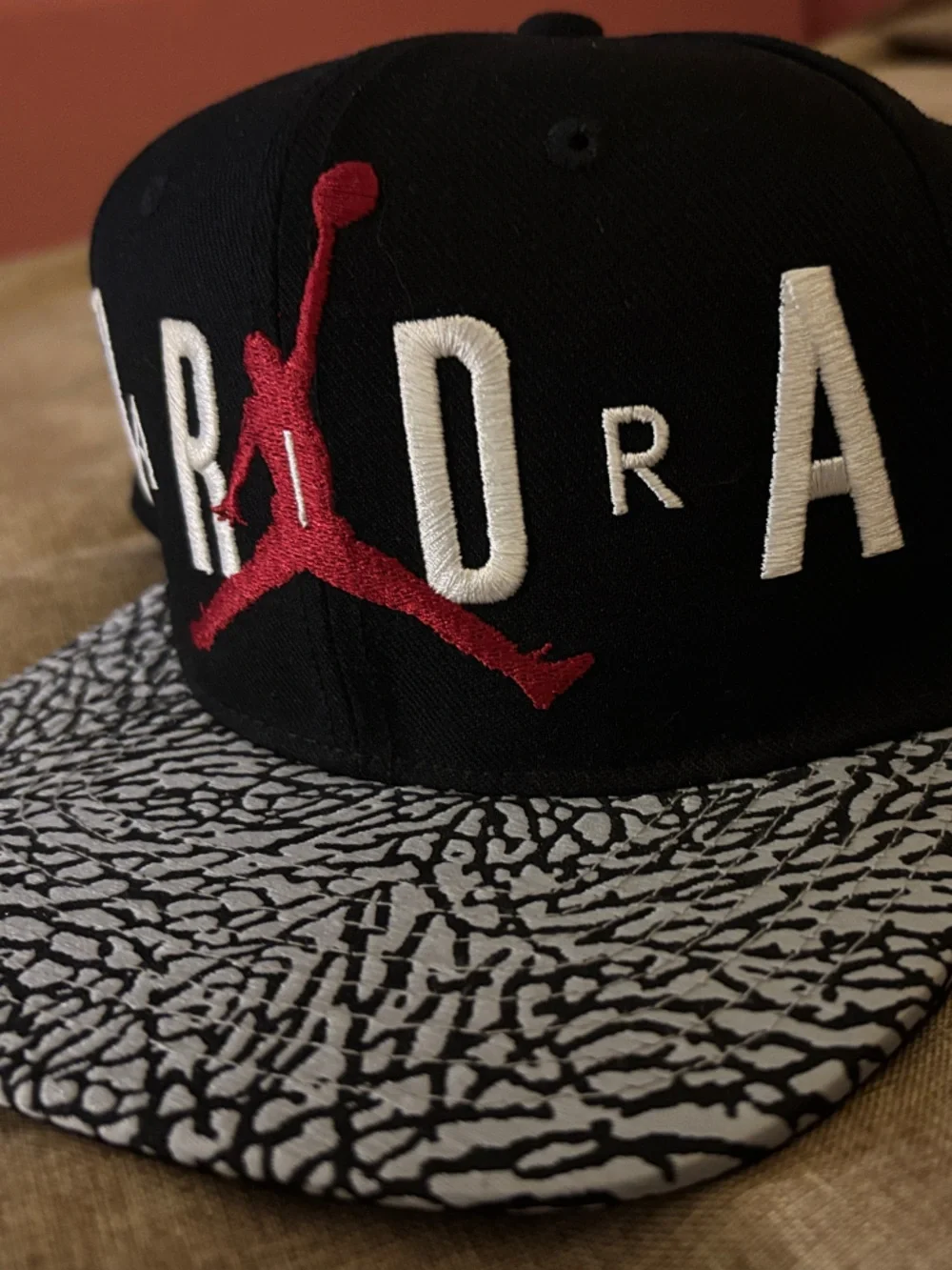 Jordan Black Snapback with Grey Elephant-Print Brim and Red Jumpman